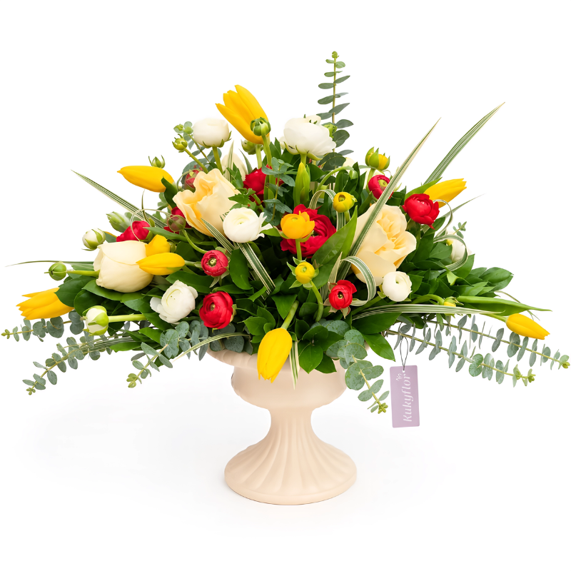 Melissa – A bowl arrangement of tulips, roses, and ranunculus