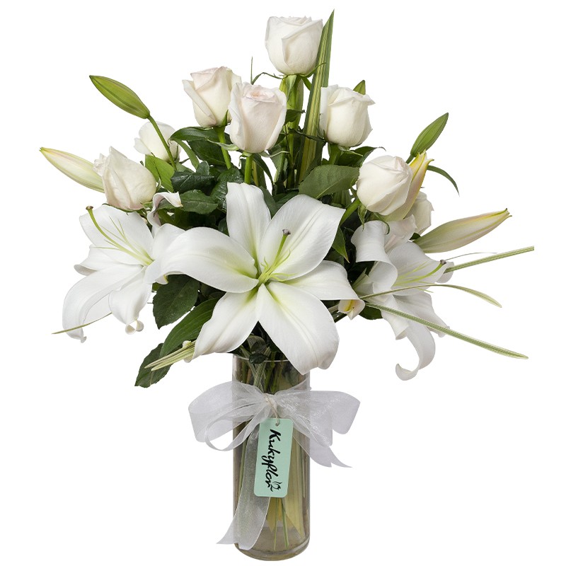 Arrangement of lilies and garden roses