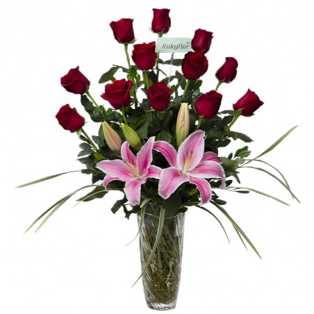 Arrangement of 12 roses and lilies in a vase