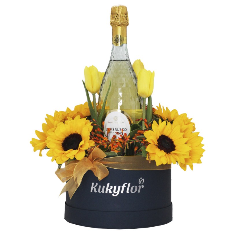 Blue bass box with sunflowers, tulips and wine