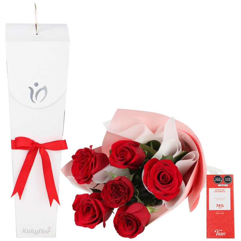 Pack of red roses in luxury box with chocolate