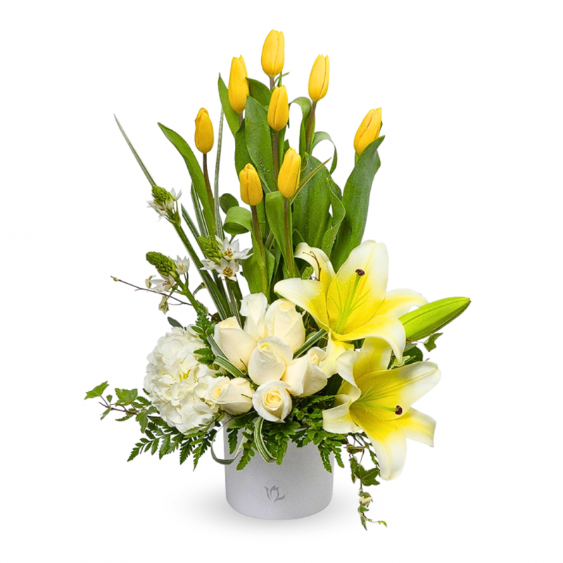 Arrangement of tulips, roses, lilies in Ceramic Base