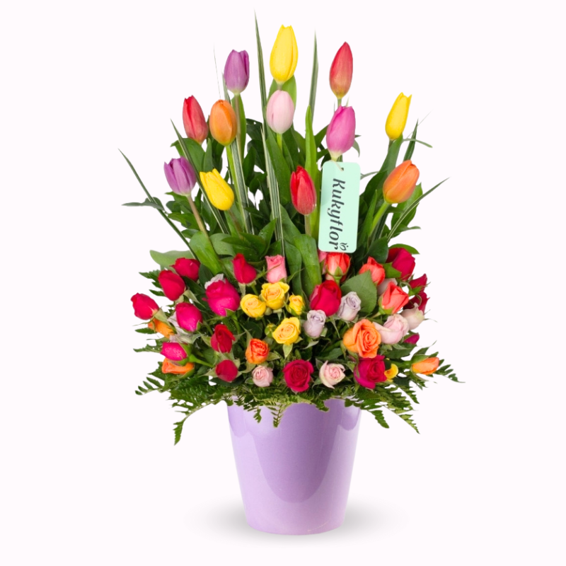Arrangement of 12 tulips and mini roses on a ceramic base
