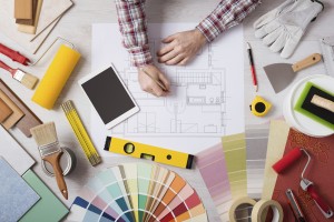 Professional decorator working at desk